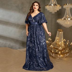 navy floral sequin gown for women side profile view on model