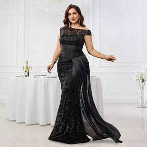 black sequin mermaid gown for women side profile view on model