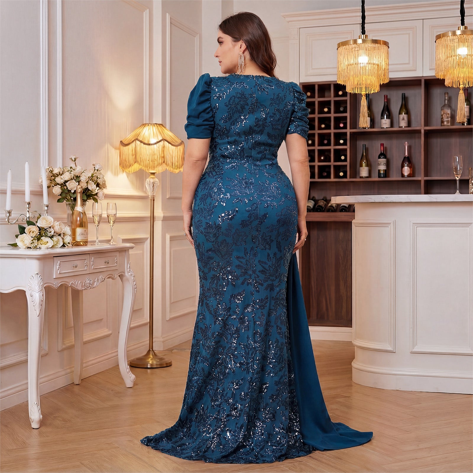 Curvy evening dress worn at garden wedding venue