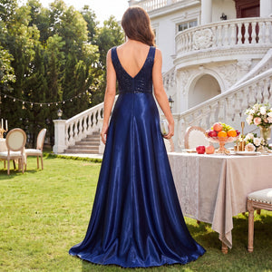 Backless detail of black sequin embroidered evening ball gown with hidden zipper