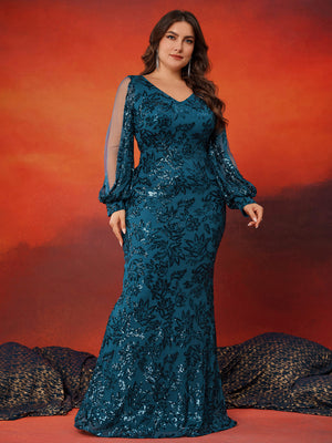 Walking pose plus‑size teal sequin long sleeve mermaid floor‑length gown