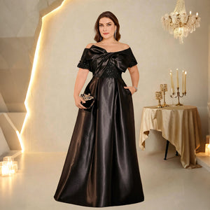 off-shoulder satin formal gown for women side profile view on model