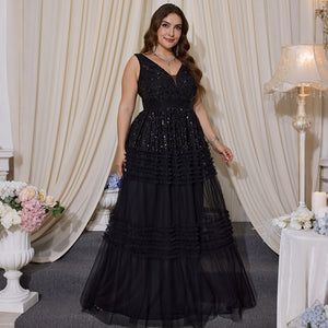 Black sequin tiered tulle formal gown indoor evening setting